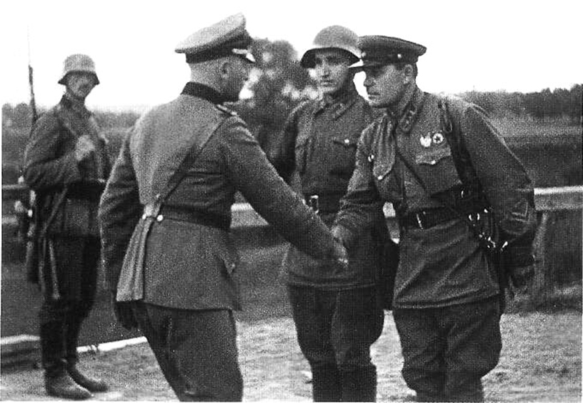 German and Soviet officers shaking hands following the invasion.  Source: TASS press agency , October 1939 / wikimedia / public domain.