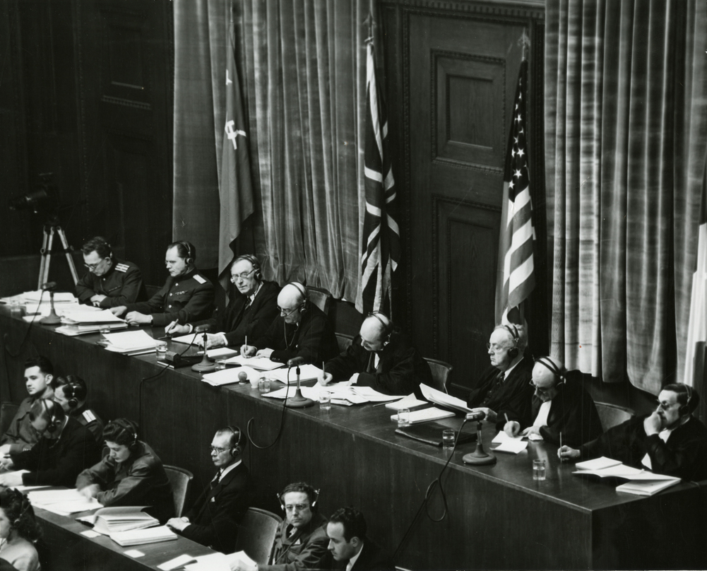 Judges sitting in Nuremberg. Source: United States Army Signal Corps photographer - Harvard Law School Library, Harvard University. Public domain