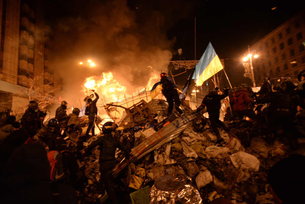 Revolution of Dignity (also known as the Maidan Revolution). Protesters fighting government forces on Independence Square on 18 February 2014.