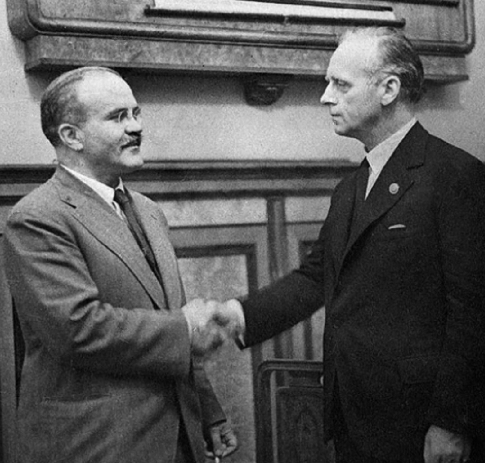 German Foreign Minister Joachim von Ribbentrop and Soviet Foreign Minister Vyacheslav Molotov before they sign the Treaty of Non-Aggression between Germany and the Union of Soviet Socialist Republics.